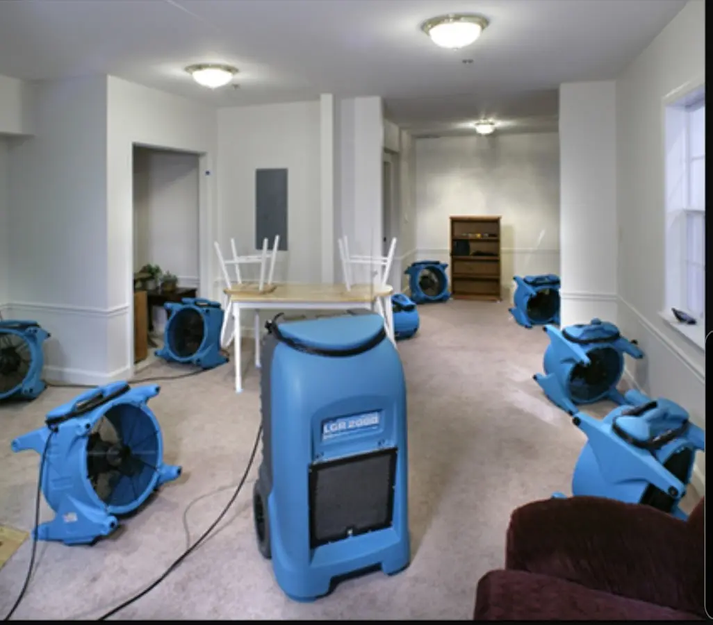 Air movers and dehumidifier setup for Water Damage Restoration in Glen Cove